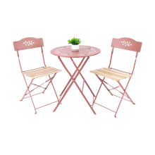 Table and Wood Slat Chairs with Leaf Pattern